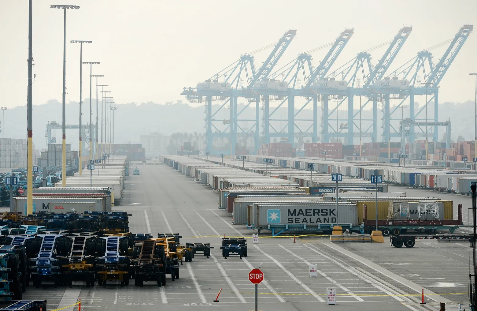 A view of containers and cranes on a foggy day at a terminal in Los Angeles on Dec. 4 2012.