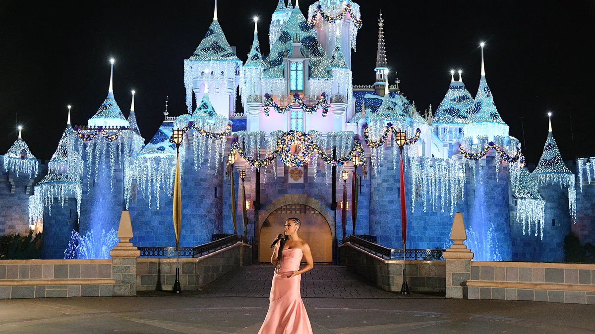 ANAHEIM, CALIFORNIA - NOVEMBER 11: Ariana DeBose surprises guests at Disneyland with a performance from "Wish" at Disneyland on November 11, 2023 in Anaheim, California. (Photo by Charley Gallay/Getty