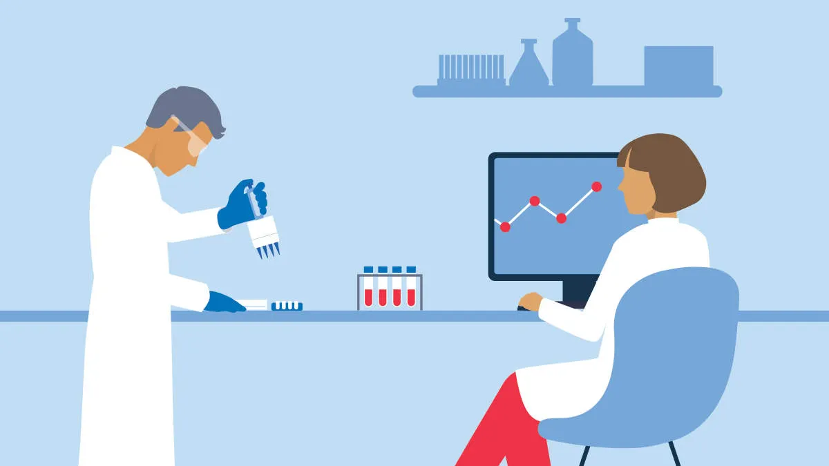Two scientists in lab working on viles.