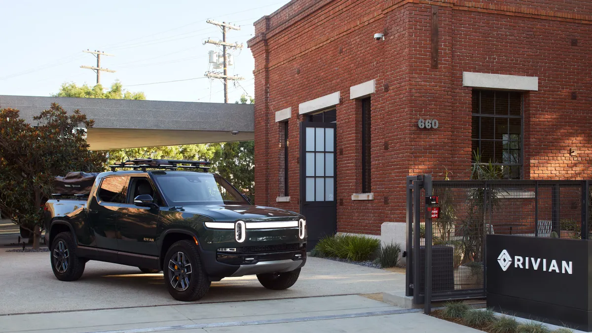 A R1-T electric pickup parked outside of Rivian's retail hub in Venice, California.
