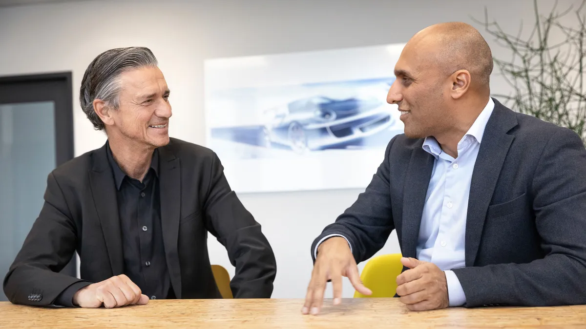 Lutz Meschke, Porsche AG Deputy Chairman of the Executive Board, Finance and IT (left), and Qasar Younis, CEO of Applied Intuition. The two companie will jointly develop automotive software.