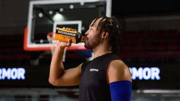 Jalen Brunson drinks BodyArmor on court