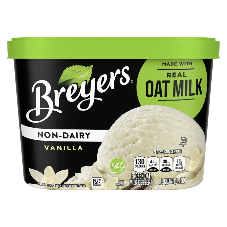 A 1.5 quart container of Breyers Non-Dairy Vanilla ice cream, made with oat milk. The container has a green lid and large label indicating oat milk in the upper right corner.