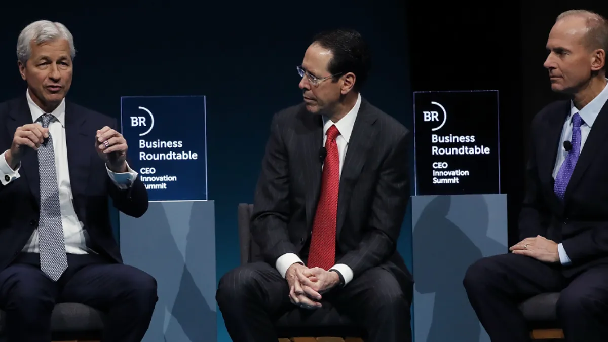 Jamie Dimon, chairman and CEO of JPMorgan Chase, Randall Stephenson, chairman and CEO of AT&T Inc., and Dennis Muilenburg, chairman, president and CEO of the Boeing Company, participate in a business