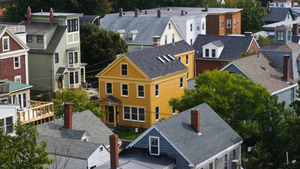 Aerial view of homes in a dense neighborhood.