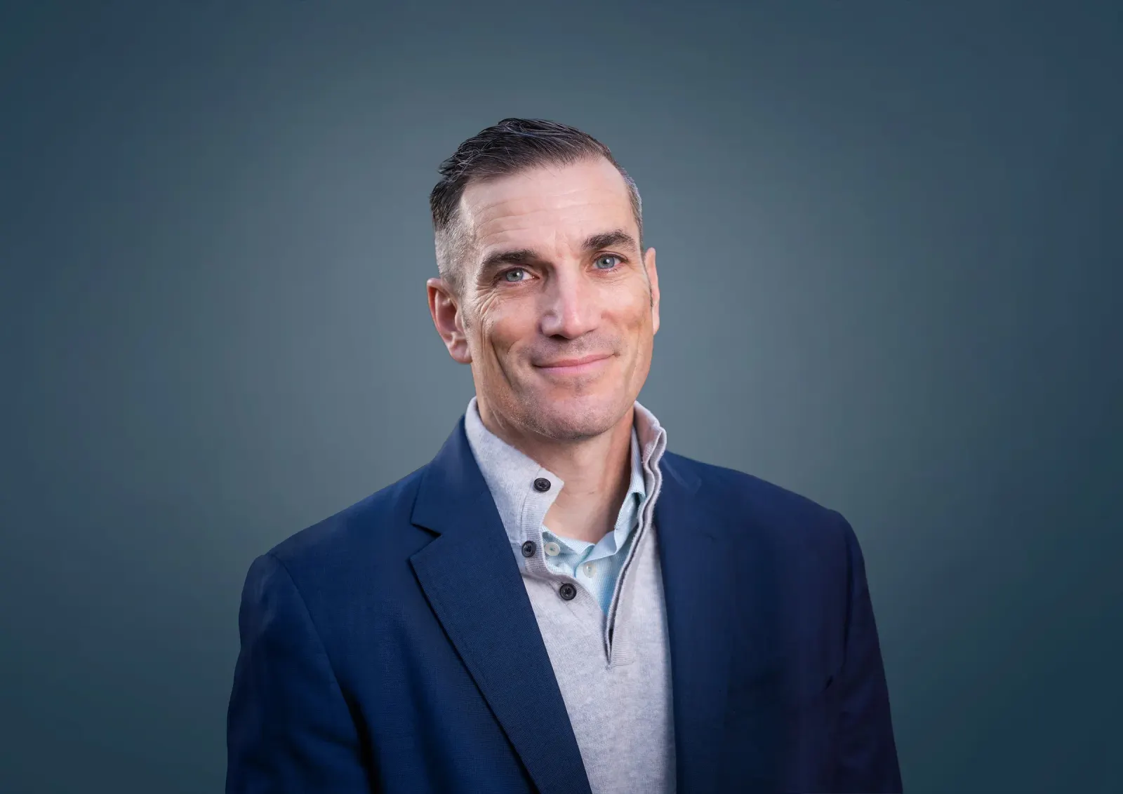 An executive headshot of new Ford Energy president Dave Carroll.