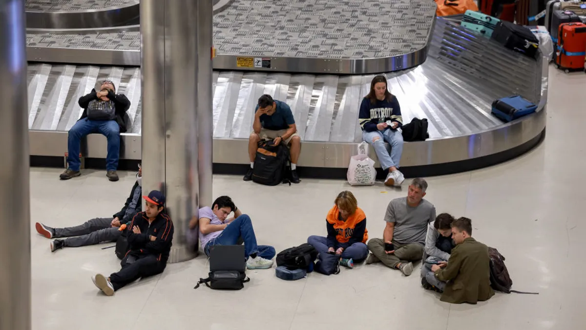 A massive IT outage stranded Delta Air Lines passengers at the Detroit Metropolitan Wayne County Airport on July 20.