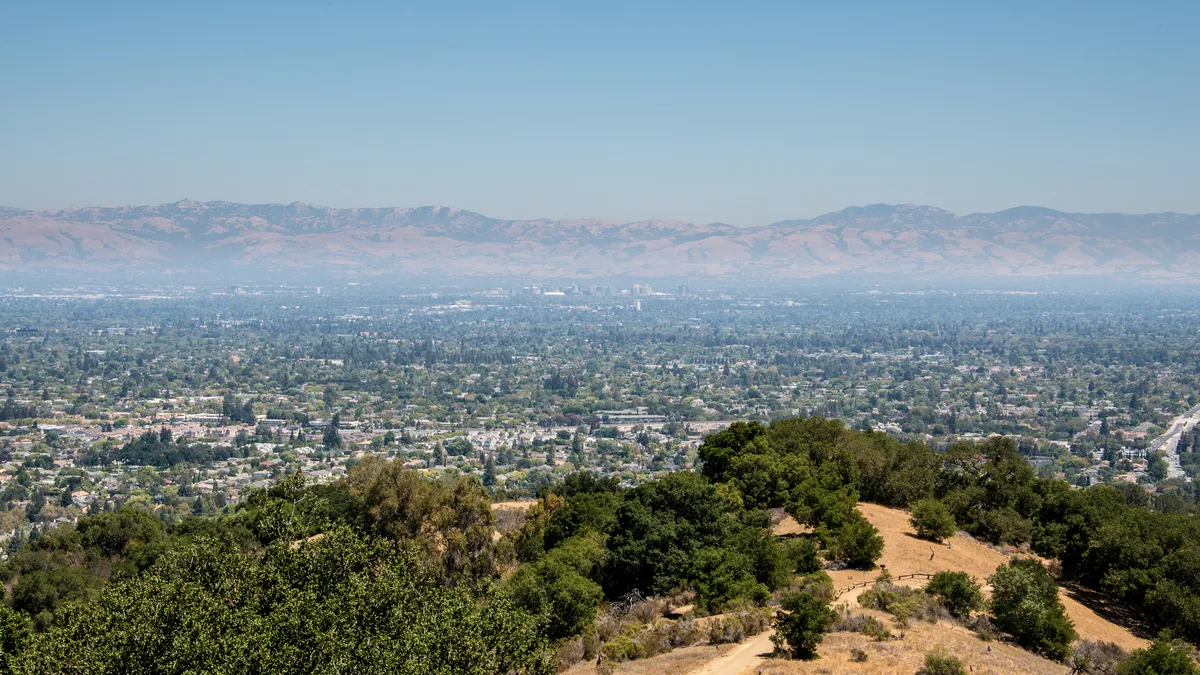 Silicon Valley as viewed from Hunter's Point in Fremont Older Open Space Preserve. The cities of San Jose, Santa Clara, Sunnyvale, and Cupertino are visible.