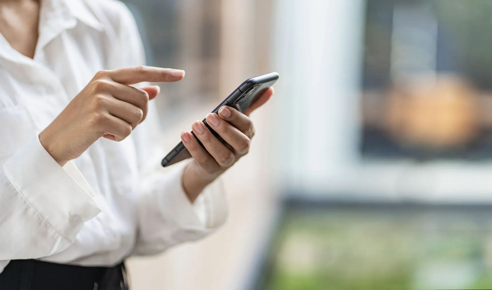 Person uses mobile phone to make payment