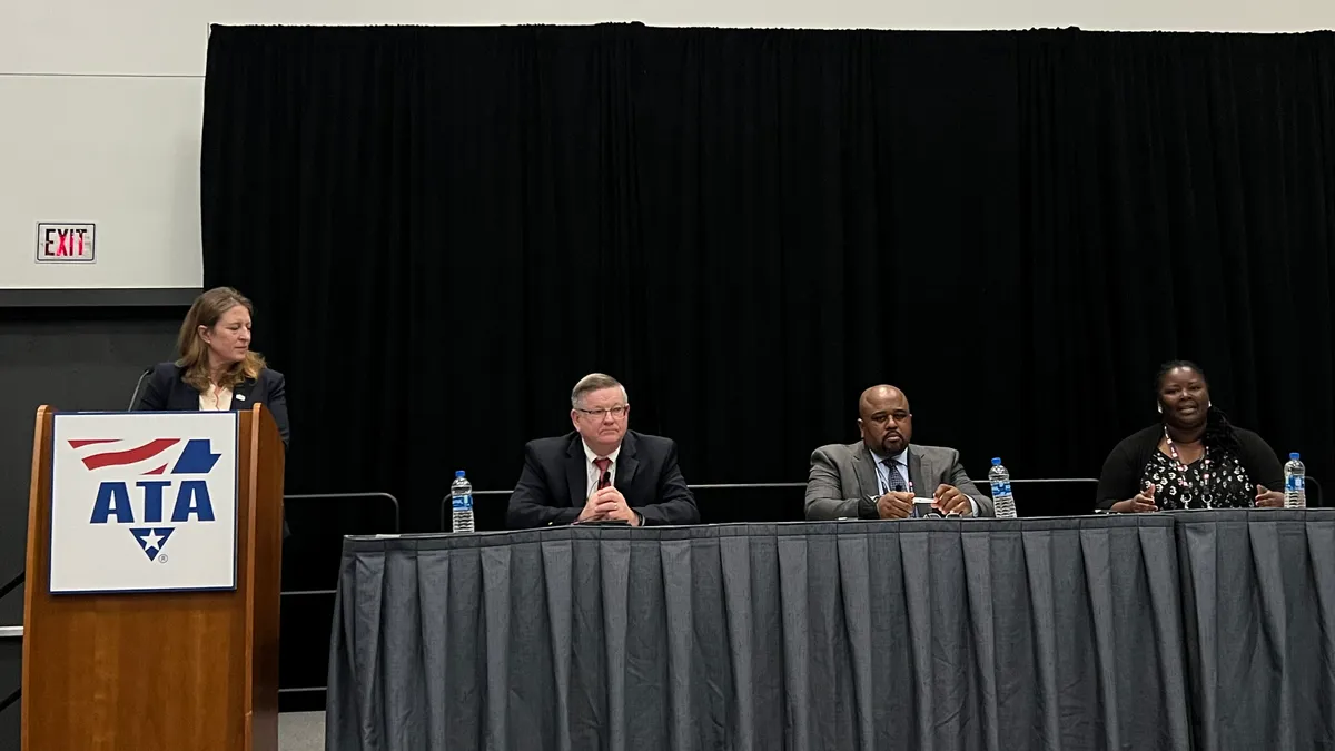 (From left to right) FMCSA head Robin Hutcheson, Executive Director Jack Van Steenburg, Chief Counsel Earl Adams Jr. and Director of External Affairs Kala Wright take questions at ATA MCE 2022.