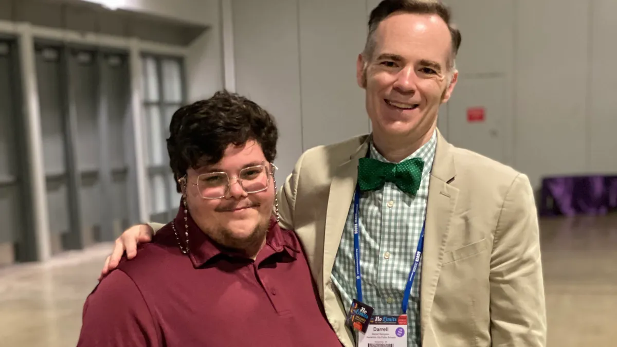 Darrell Sampson and Gavin Grimm pose together at the American School Counselor Association conference