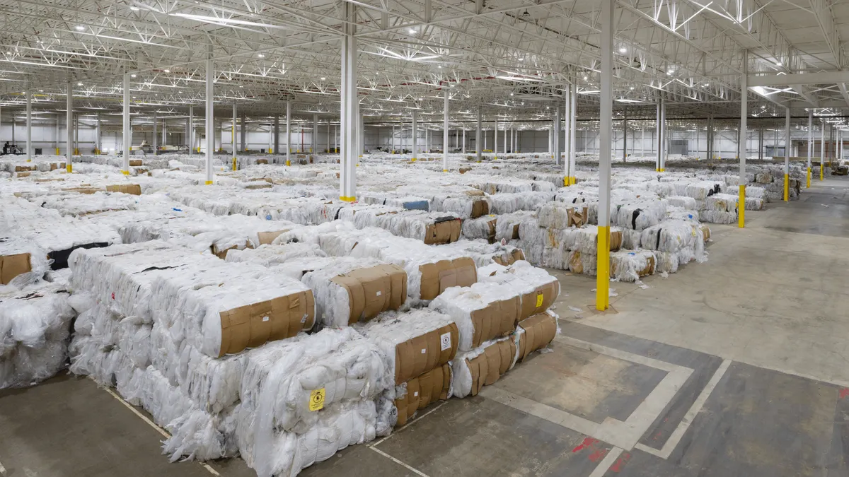 Bales of plastic in a warehouse