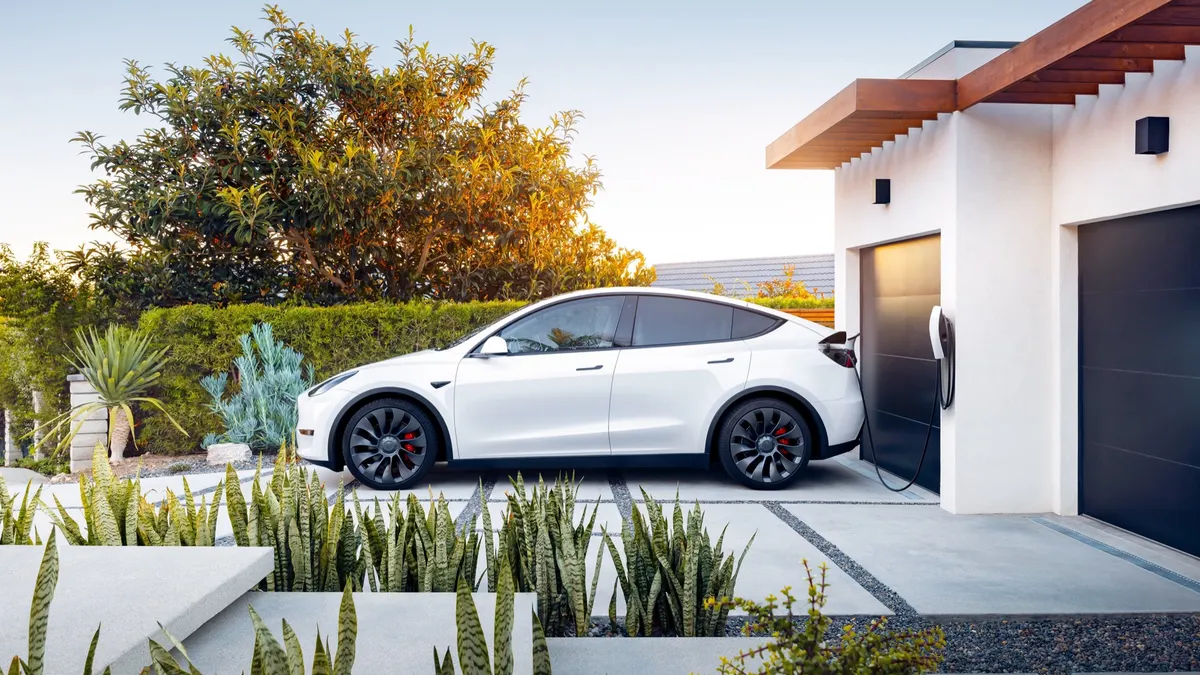 Tesla Model Y with Tesla Wall Connector