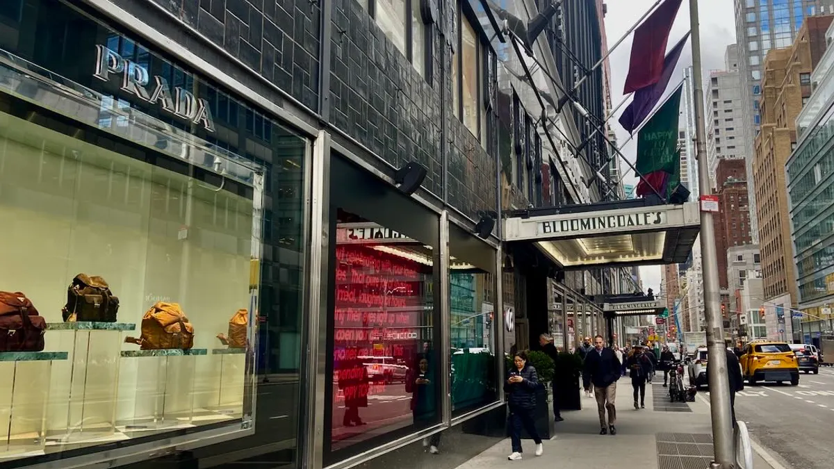 People walking by Bloomingdale's New York City store.