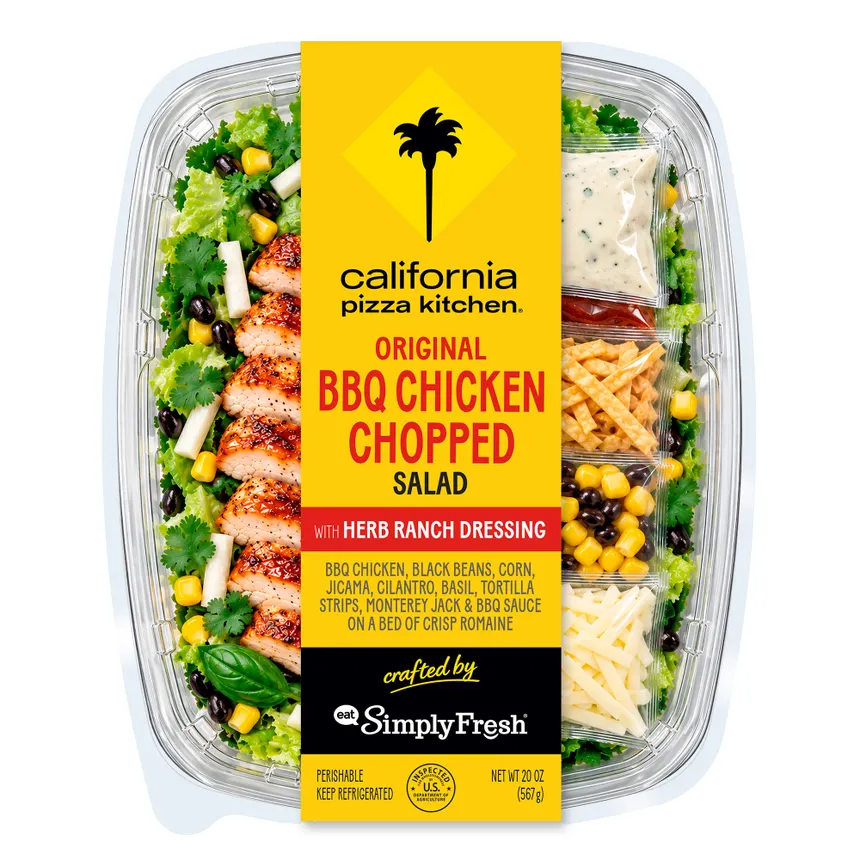 A box of California Pizza Kitchen salad.