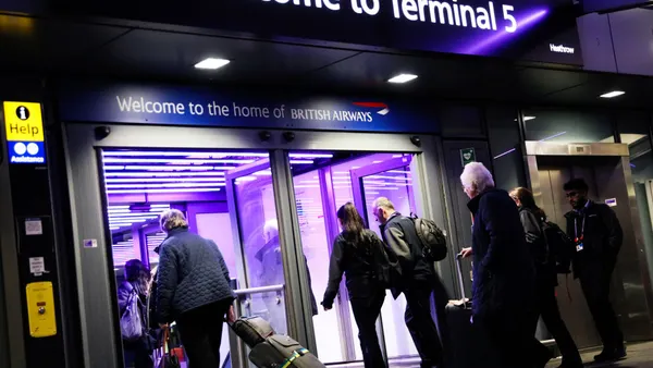 Passengers arrive at Terminal 5 as flights resume at Heathrow on March 22, 2025 in London, England. A September 2025 cyberattack against a third-party vendor delayed flights out of numerous European airports, including Heathrow.