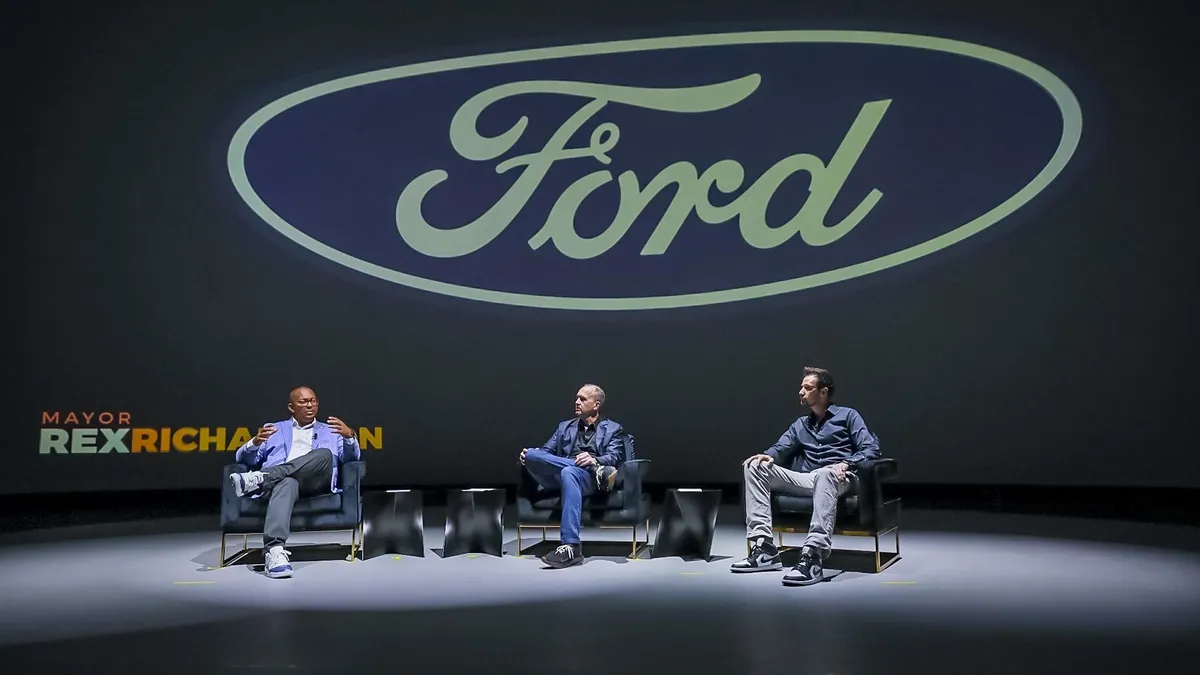 Long Beach mayor Rex Richardson and Ford Motor executives Doug Field and Alan Clark announcing the new EV development center at a media event..