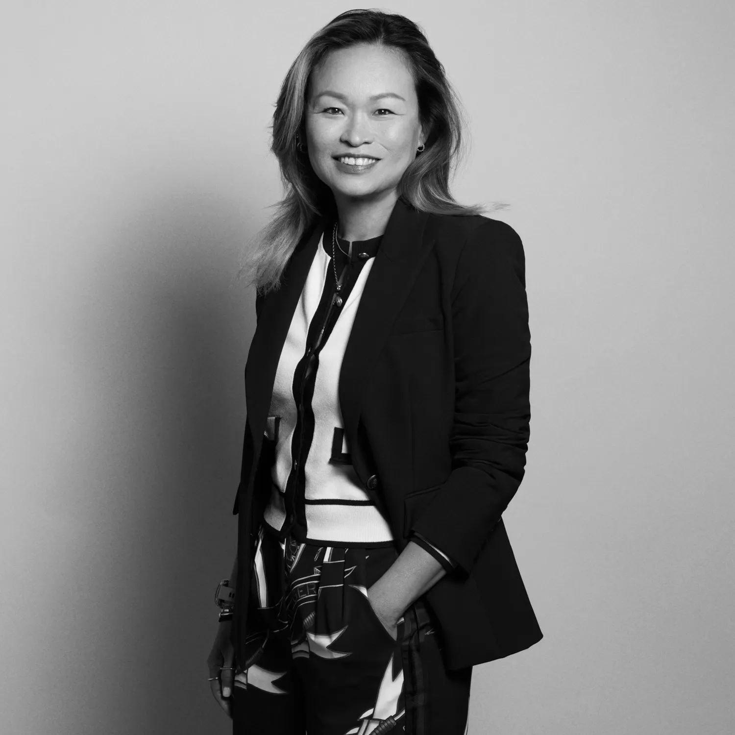 Adelyn Cheong poses in a black-and-white headshot.