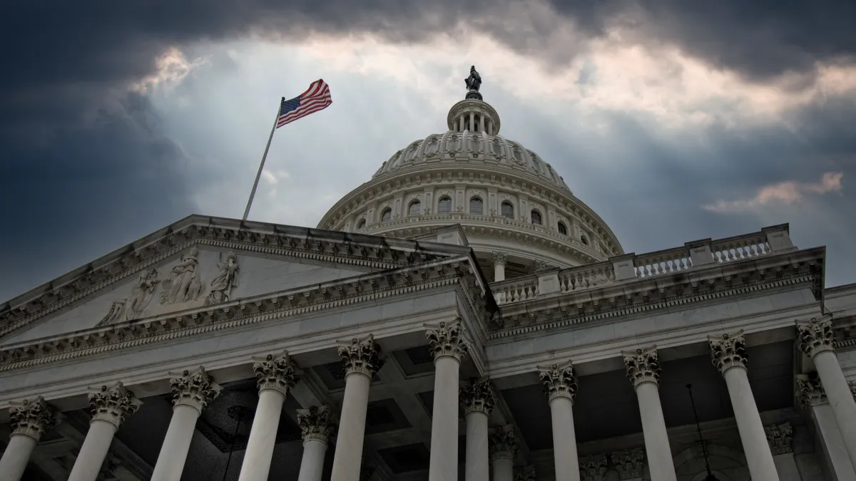 U.S. capitol building with stormy skies