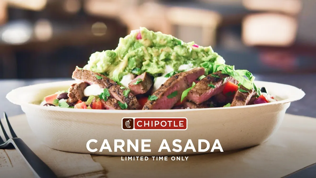 A bowl loaded with Chipotle's Carne Asada LTO.