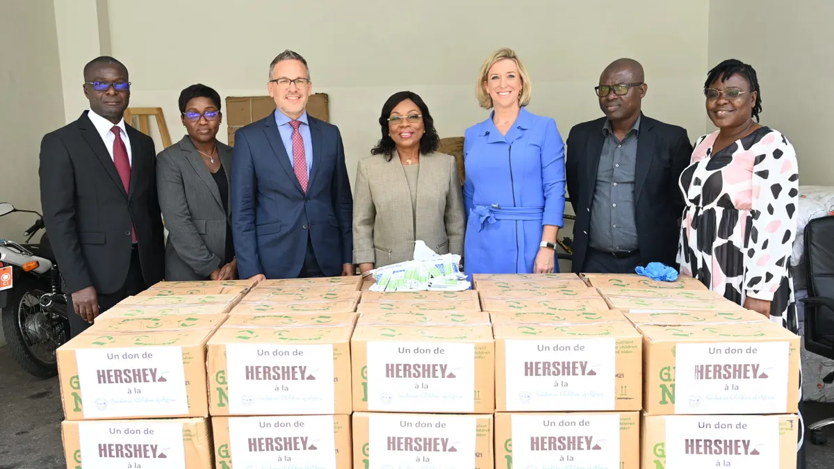 Hersheys executives posing for photo