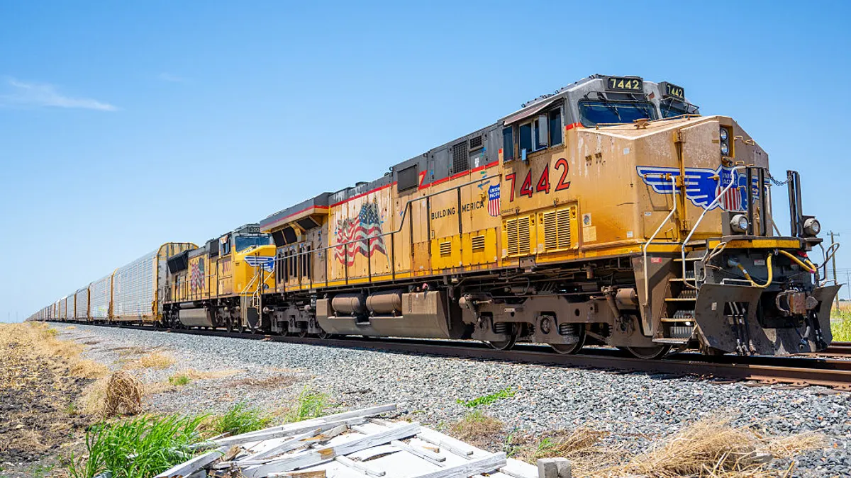 A Union Pacific freight train travels.