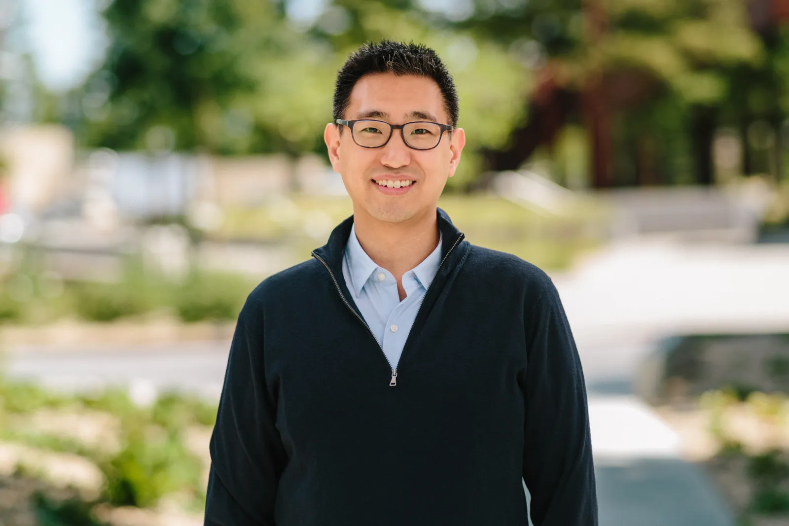 Professional headshot of Daniel Chu.