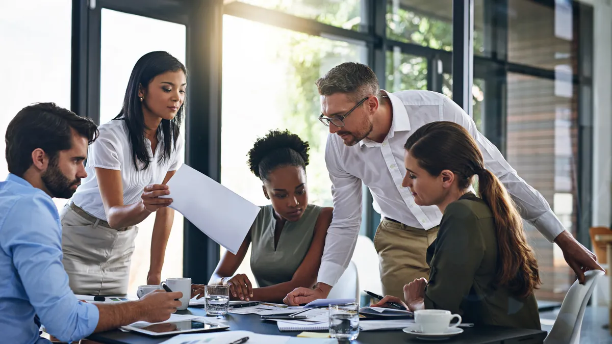 Enterprise employees wait for an in-house lawyer to address their questions