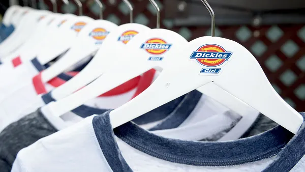 A rack of shirts on hangers.