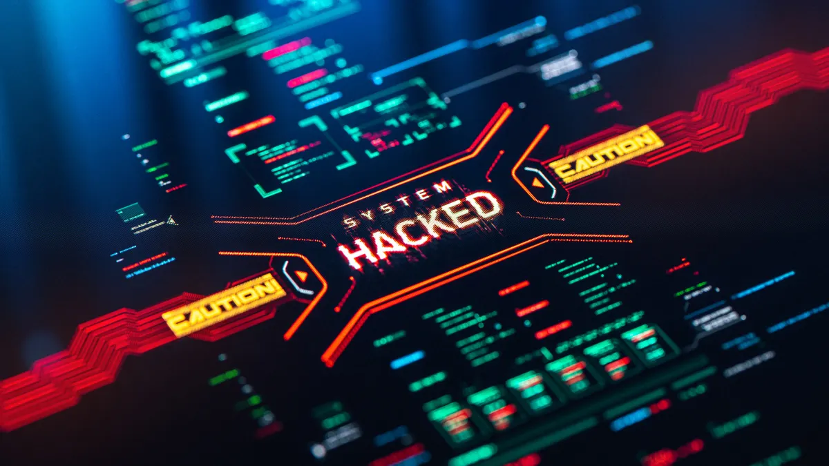 Computer motherboard with words "Caution: System Hacked"
