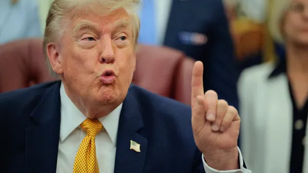 President Donald Trump holding up his finger
