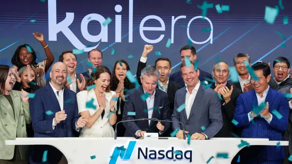 Kailera employees celebrate while ringing the opening bell at Nasdaq.