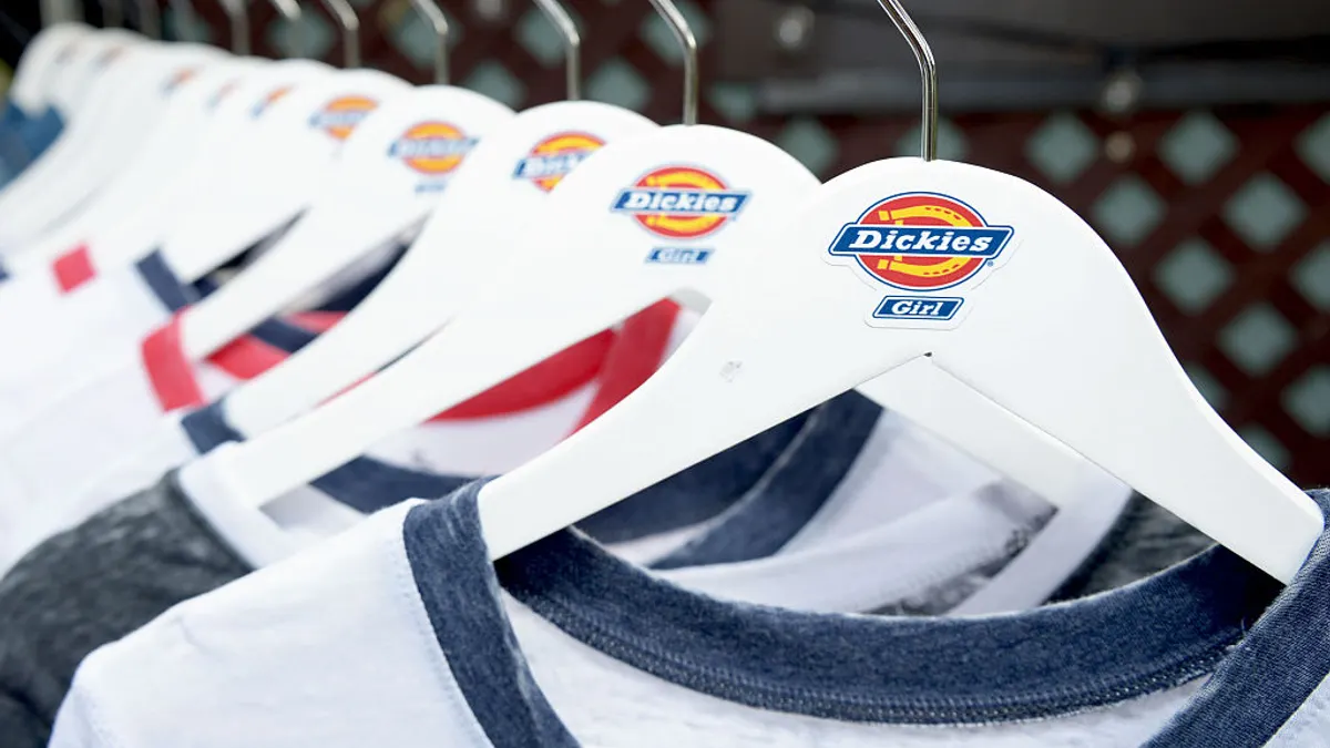 A rack of shirts on hangers.