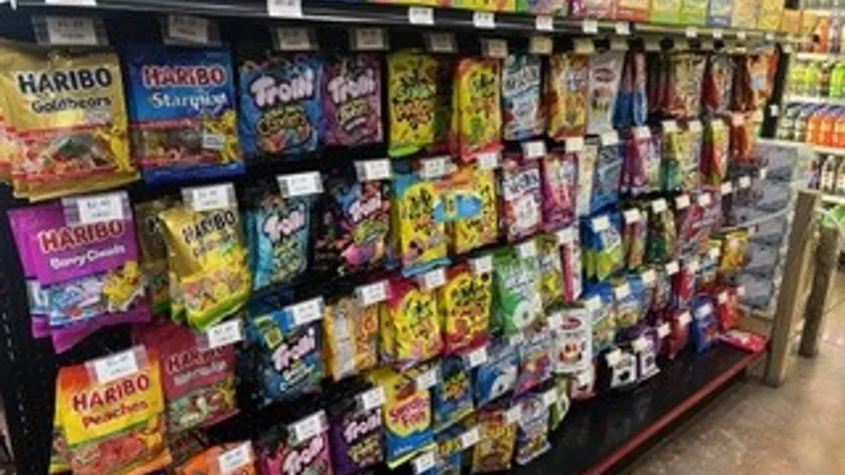 A photo of the candy aisle inside a Pinnacle 365 store.