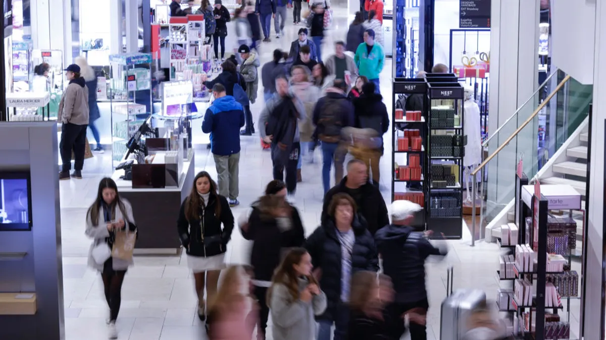 A crowd inside the Macy's Herald Square store on Black Friday 2023.