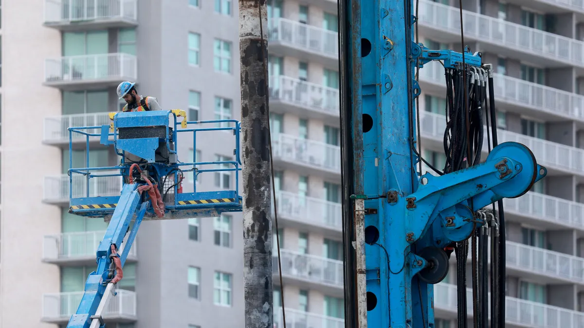 A construction worker helps build a residential building on January 05, 2024 in Miami, Florida.