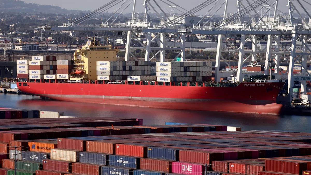 Shipping containers are stacked on the Matson Oahu container ship at the Port of Long Beach on November 24, 2021.