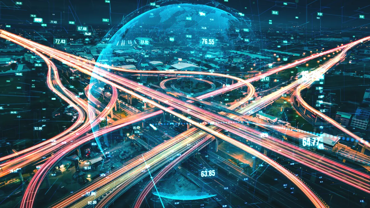 Futuristic road transportation technology with digital data transfer graphic showing concept of traffic big data analytic and internet of things