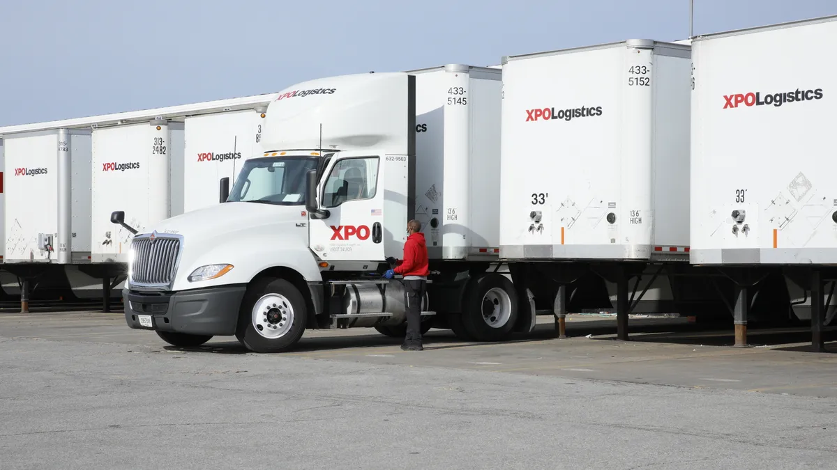 An XPO driver with his truck.