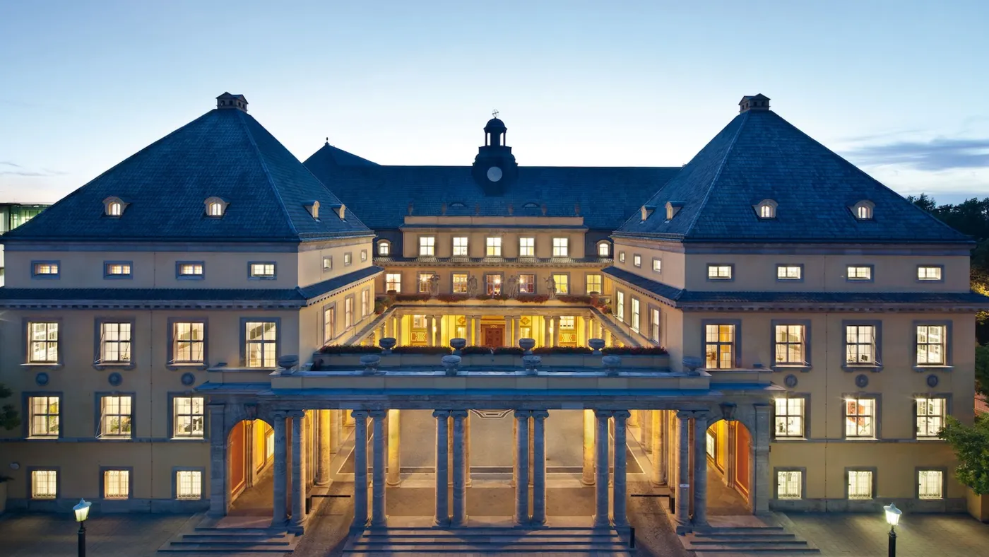 The main office building at Munich Re at night.