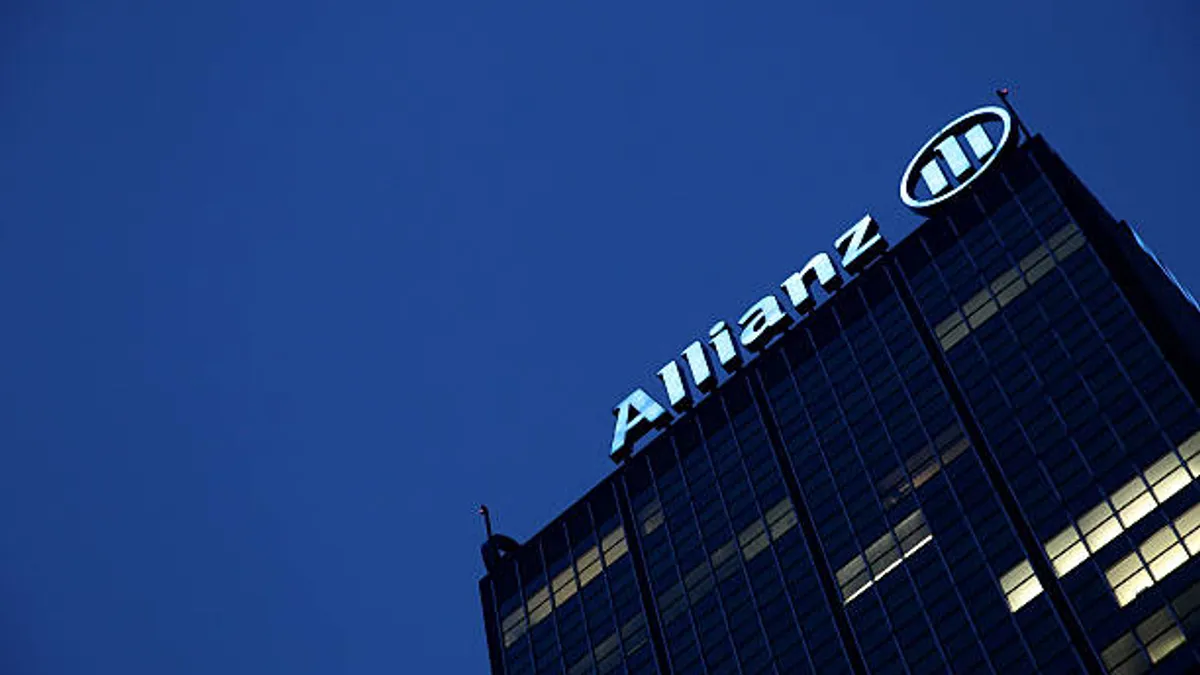 The logo of the German insurer seen on a Berlin, Germany office building in 2010.