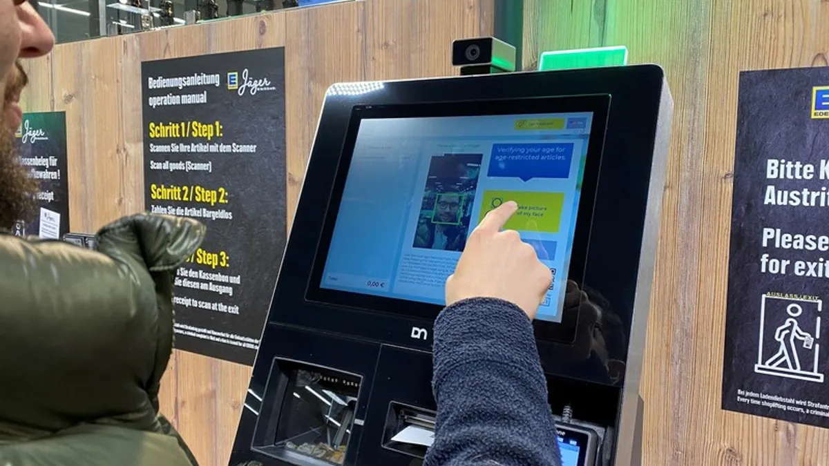 A photo of a self checkout kiosk with automated age verification technology.