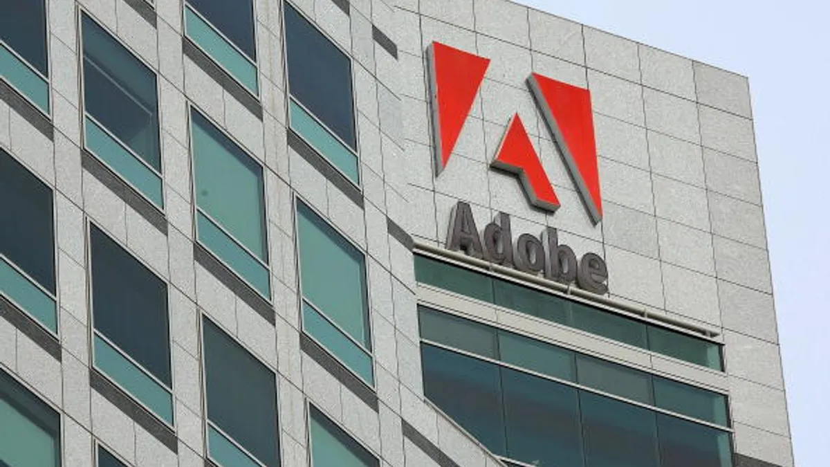 The Adobe logo is displayed on the side of the Adobe Systems headquarters January 15, 2010 in San Jose, California.