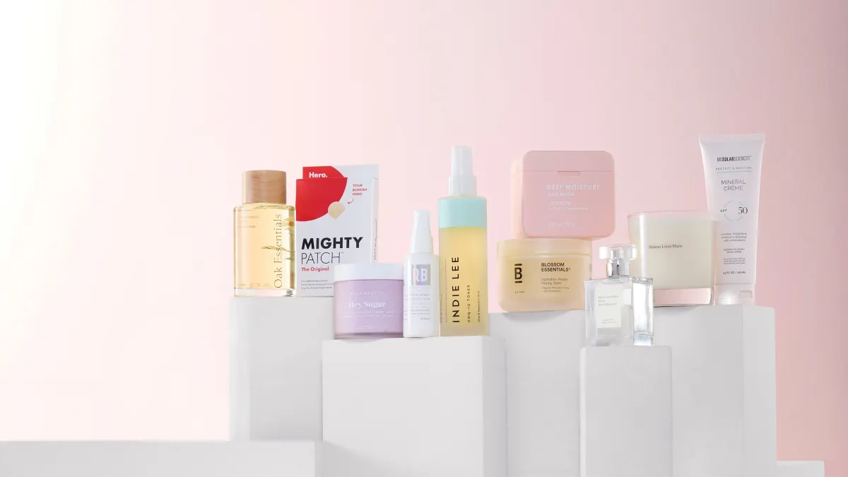An assortment of beauty products on pedestals that will be available through Belk with BeautySpace