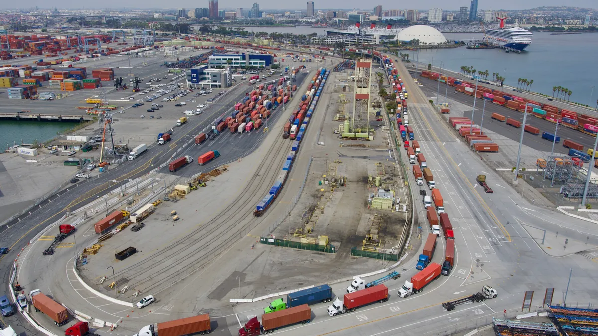 Trucks line up to enter ITS Terminal at the Port of Long Beach on Friday, March 17, 2023.