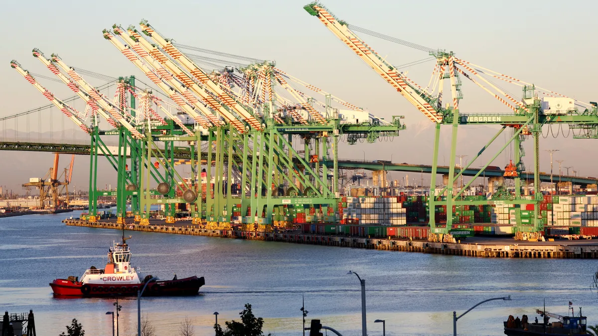 Container cranes stand idle at the Port of Los Angeles amid a cargo slowdown on November 16, 2022 in Los Angeles, California.