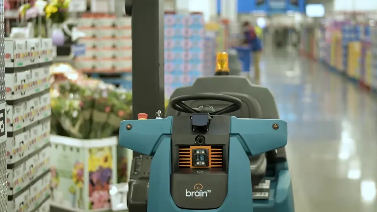 Floor-scrubbing robot equipped with inventory-scanning technology controlled by software from Brain Corp