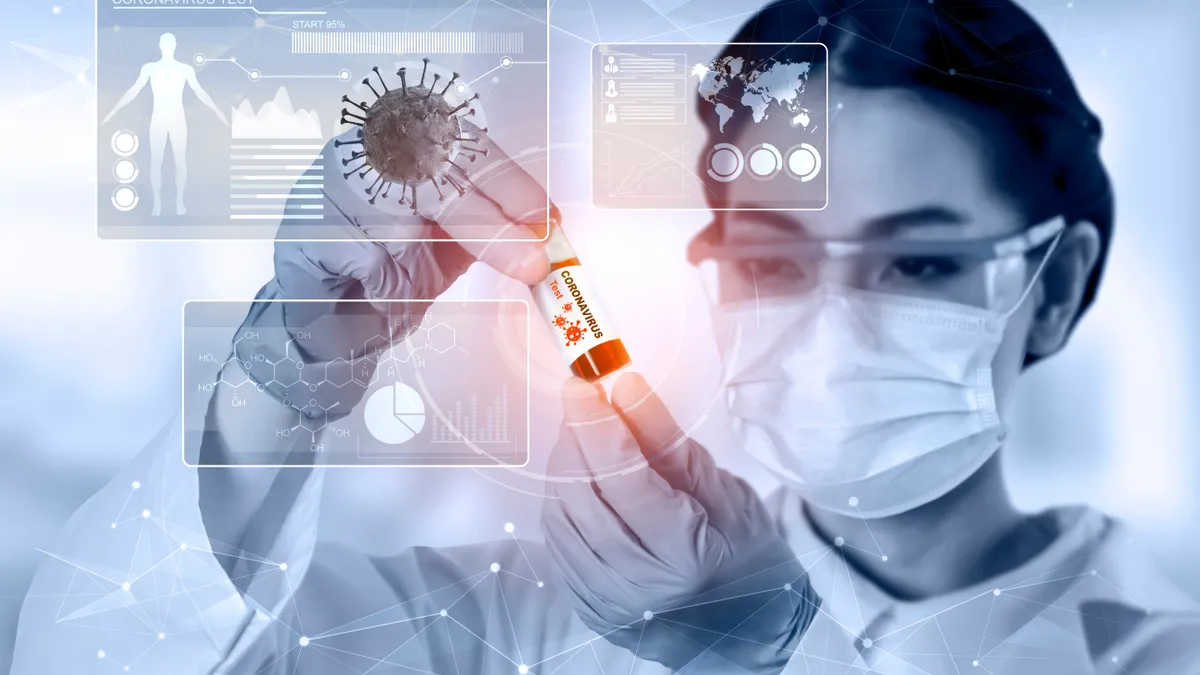 Scientist looking at a test tube In a laboratory