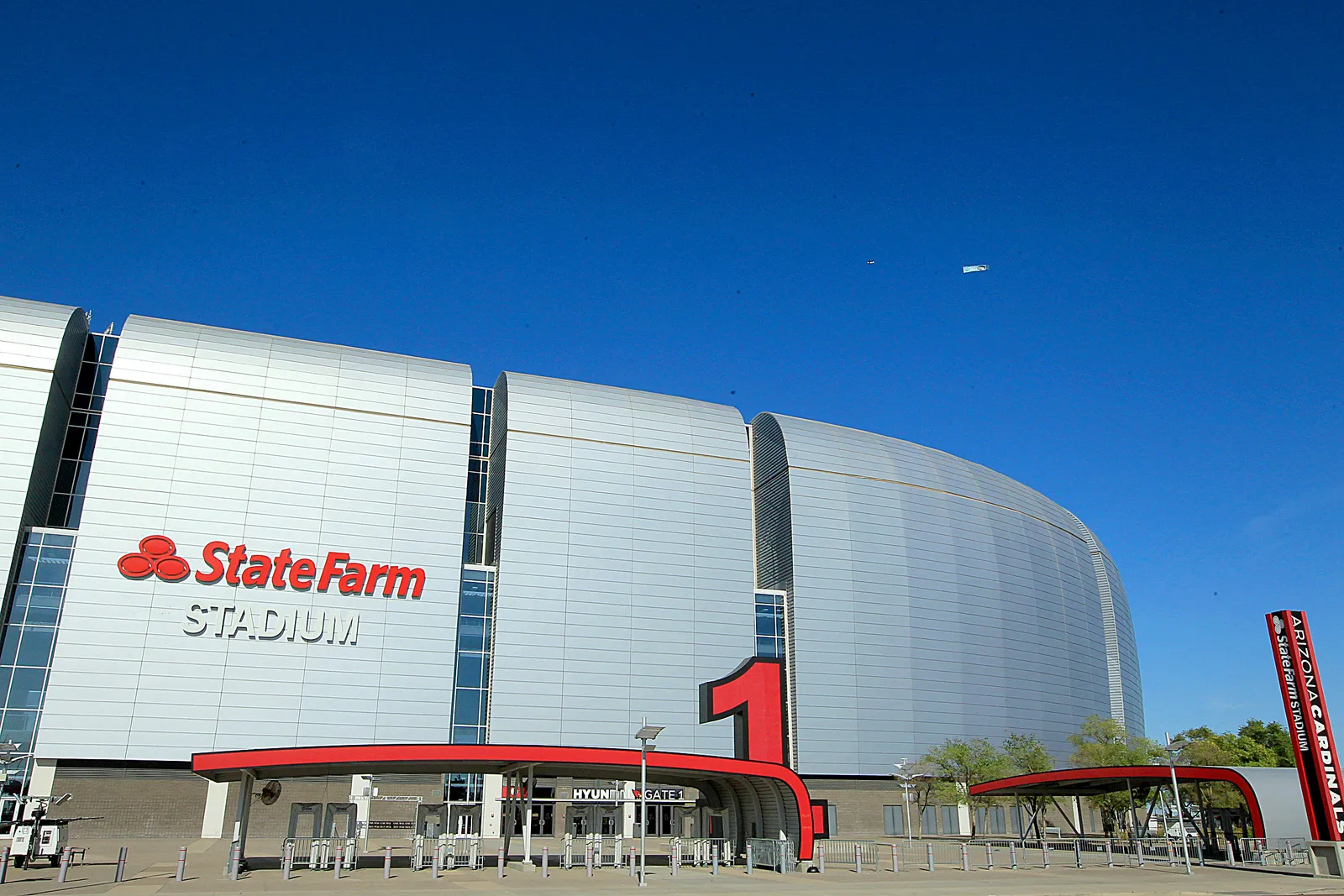 A photo of the outside of State Farm Stadium.`