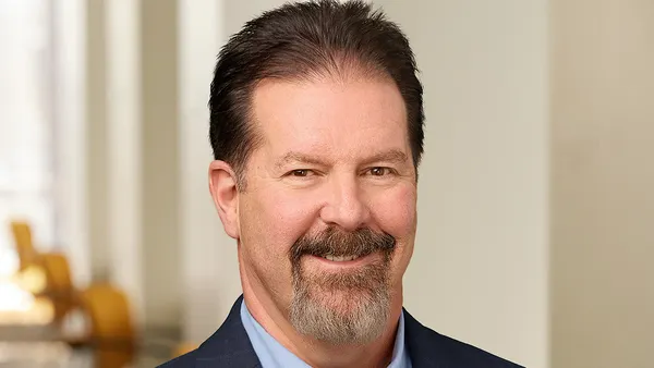 headshot of Brett Helm
